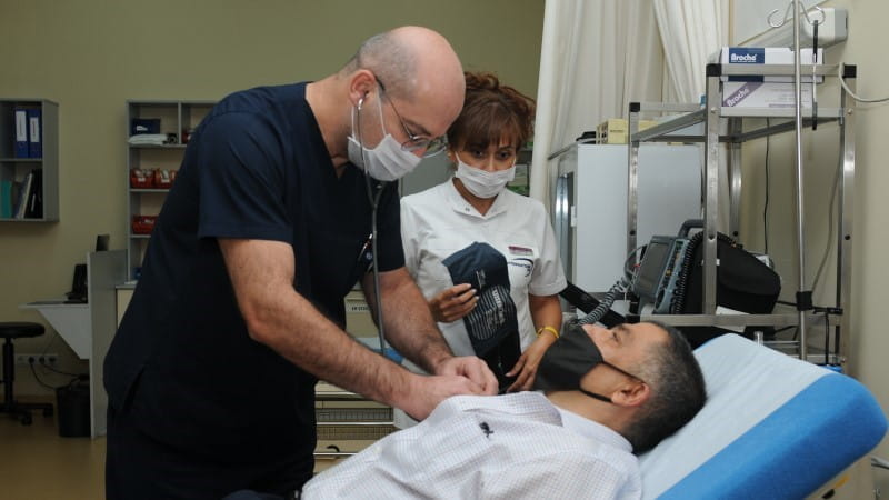 doctor and nurse with patient
